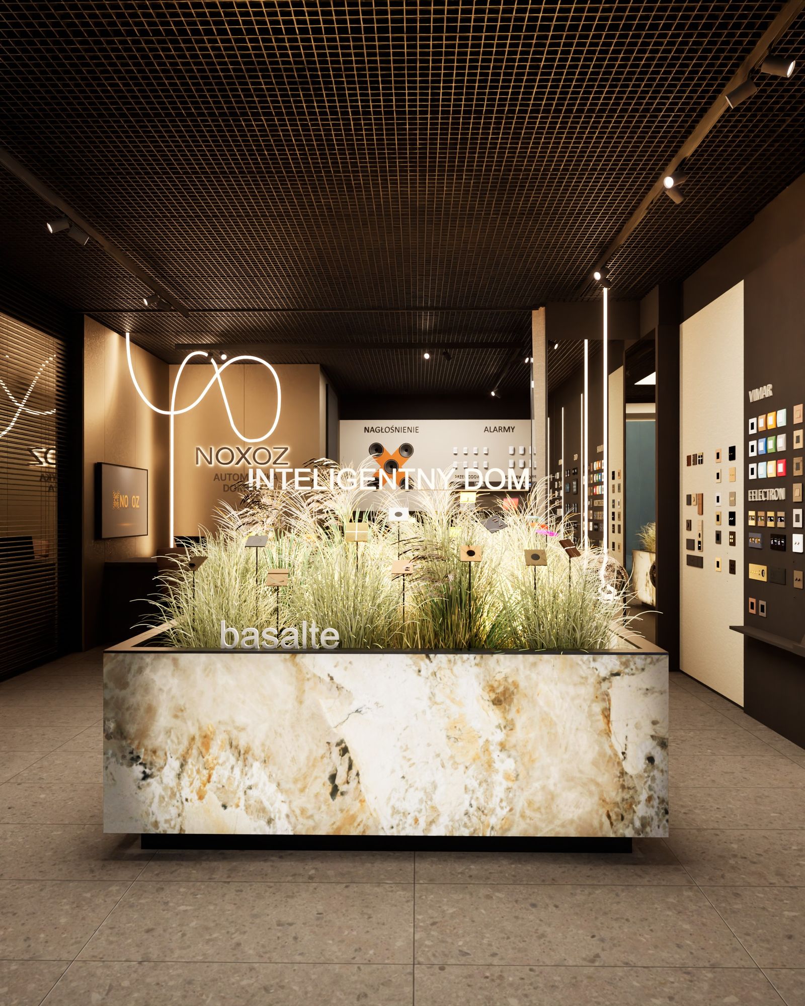 Showroom NOXOZ: podświetlona wyspa z kamienia z trawami i panelami Basalte, w głębi świetlna linia i neon NOXOZ Inteligentny Dom